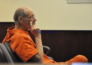 Duncan Aker Jr. waits for his hearing to begin Friday afternoon in Lewis Circuit Court. - Photo by Dennis Brown