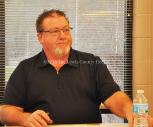 Bryan McRoberts conducts a meeting of the Lewis County Board of Education Monday evening. - Photo by Dennis Brown