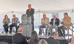 Rep. Rocky Adkins speaks during the groundbreaking ceremony at Superior Composites. Left to right, Amy Kennedy, Todd Ruckel, Rocky Adkins, Matt Ginn, Kenn Moritz and John Tippins. - Photo by Dennis Brown