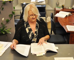 Lewis County Clerk Glenda Himes reviews Kentucky law regarding elections in which no candidates have filed for a specific office. - Photo by Dennis Brown