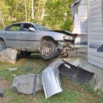 Damage is evident following an accident Sunday afternoon on Kinney Road south of Garrison. - Dennis Brown Photo