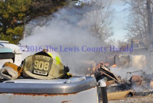 Firefighters were called to Old Trace Hill Road Thursday when a home there was reported on fire. The home was destroyed in the fire which also resulted in an apparent death. - Dennis Brown Photo