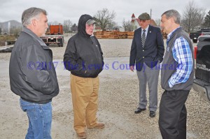 Officials discuss the connection of a rail spur in Garrison to serve a new tie yard there. Pictured, left to right, are County Road Supervisor Bob Moore, Tram President Terry LeMaster, County Attorney Thomas M. Bertram II, and Judge Executive Todd Ruckel. - Dennis Brown photo