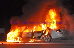 No one was hurt as a result of this auto fire on the AA Highway near the Grayson Spur. - Dennis Brown Photo