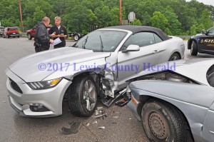 Deputy Matt Ross is investigating a two-vehicle accident at the intersection of the AA Highway and Grayson Spur on Thursday afternoon. No one was seriously hurt in the crash. - Dennis Brown Photo