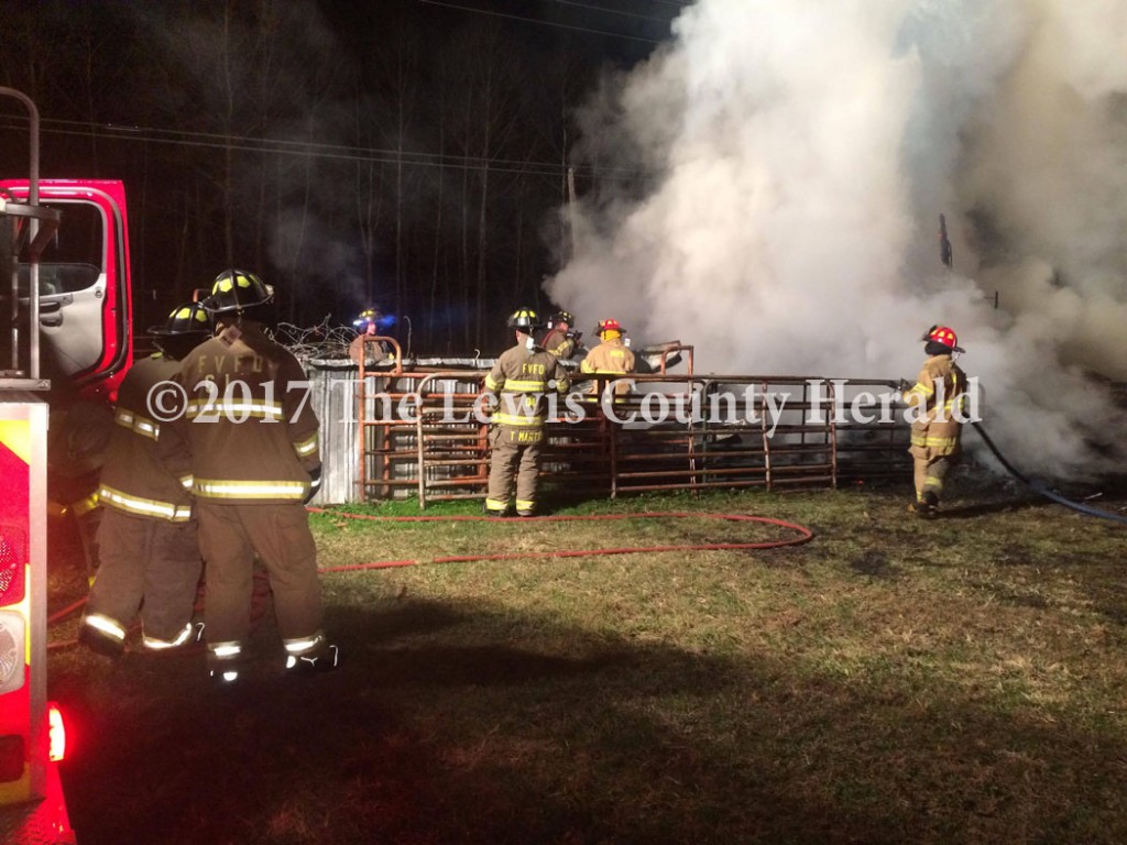 Firefighters from Garrison and Firebrick assisted Maloneton firefighters in battling a barn fire in Greenup County Wednesday night. - Hammer Cooper Photo