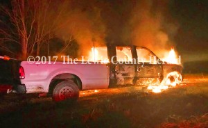 Deputy Bryon Walker is investigating this fire that destroyed a truck belonging to Mason County Fiscal Court as well as the theft of several tools from the Mason County Road Department. - George Sparks Photo