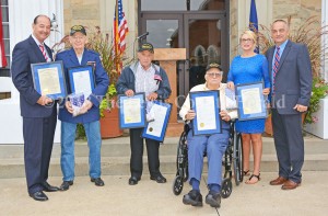 Surviving WWII Veterans honored on Patriot Day. Pictured, left to right, are State Representative Rocky Adkins, Mart Dummitt, Forrest Cooper, Hank McCane, WoodmenLife Representative Shirley Williams, and Judge Executive Todd Ruckel. - Dennis Brown Photo