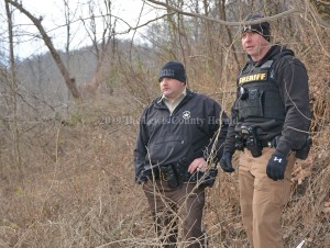 Deputy Matt Ross, left, and Deputy Mark Sparks at the scene of a death investigation Friday afternoon near Garrison. - Dennis Brown Photo